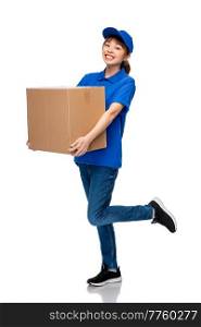 mail service and shipment concept - happy smiling delivery woman with parcel box in blue uniform over white background. delivery woman in blue uniform with parcel box