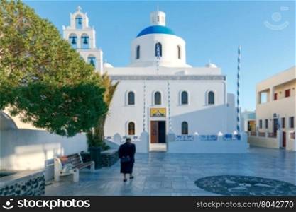 Main white blue orthodox church of Panagia Platsani, in the village of Oia. Santorini.
