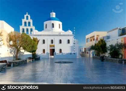 Main white blue orthodox church of Panagia Platsani, in the village of Oia. Santorini.