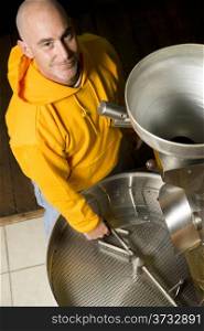 Maintenance Man Checks Coffee Roasting Cooling Hopper