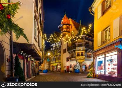 Maison Pfister in old town of Colmar, decorated and illuminated at christmas time, Alsace, France
