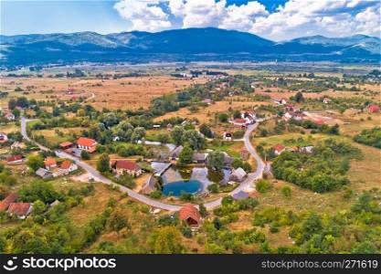 Majerovo vrilo Gacka river source and valley aerial view, Lika region of Croatia