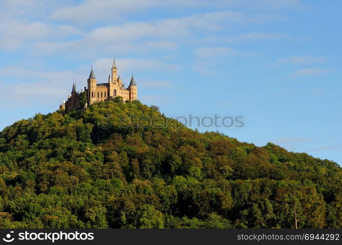 Majestic Hohenzollern Castle on top of Mount Hohenzollern at sunset, Germany