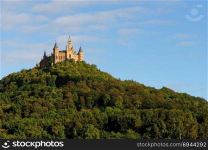 Majestic Hohenzollern Castle on top of Mount Hohenzollern at sunset, Germany