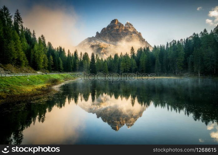 Majestic landscape of Antorno lake with famous Dolomites mountain peak of Tre Cime di Lavaredo in background in Eastern Dolomites, Italy Europe. Beautiful nature scenery and scenic travel destination.