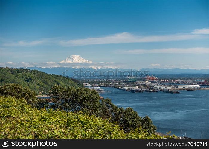 Majestic Mount Rainier rises up over the Port of Tacoma in Washington State.