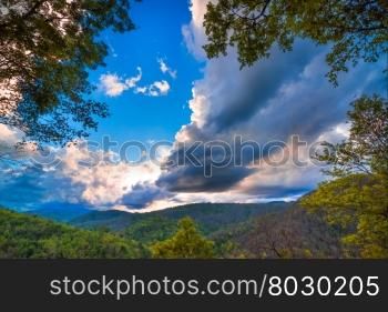 Majestic mountains landscape under morning sky with clouds
