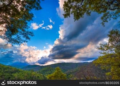 Majestic mountains landscape under morning sky with clouds