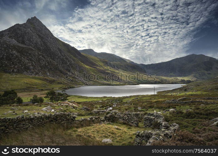 Majestic sky over landscape of Tryfan and Llyn Ogwen in Snowdonia Wales