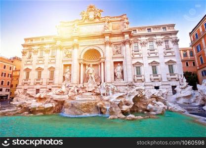 Majestic Trevi fountain in Rome sun haze view, eternal city, capital of Italy