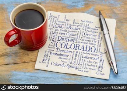 major cities of Colorado (with population more than 5000) word cloud - handwriting on a napkin with a cup of coffee