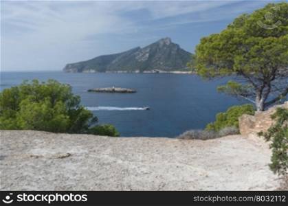 Majorca landscape with boat and isle of Dragonera.