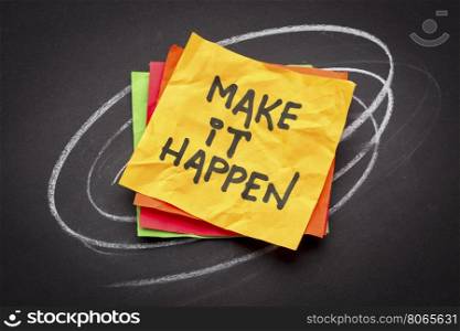 make it happen, motivational slogan, colorful sticky notes against black paper with white chalk drawing