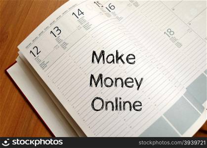 Make money online text concept write on notebook