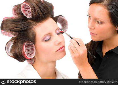 Make-up artist woman fashion model apply eyeshadow with brush