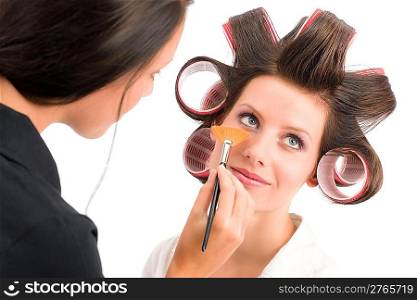 Make-up artist woman fashion model apply powder blush rouge brush