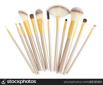 Make up silver and gold brushes isolated on white background. Make up brushes