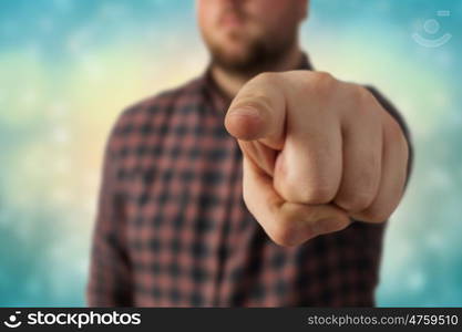 Make your choice. Close view of man in casual pointing with finger to camera