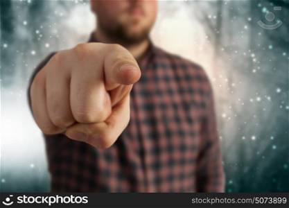 Make your choice. Close view of man in casual pointing with finger to camera