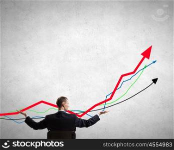 Make your income grow. Back view of businessman hold growth arrow graph