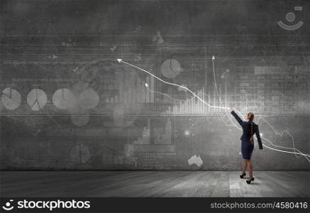 Make your income grow. Young businesswoman catch with hand growing graph arrow