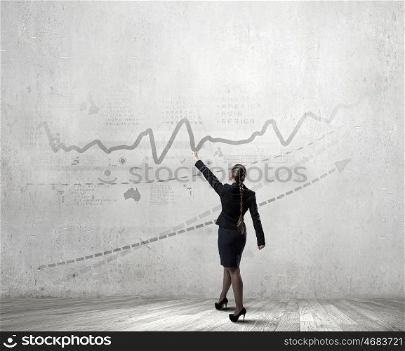 Make your income grow. Young businesswoman catch with hand growing graph arrow