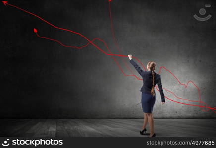 Make your income grow. Young businesswoman catch with hand growing graph arrow