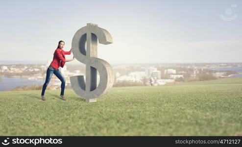 Make your income grow. Young girl in red jacket pushing dollar big sign