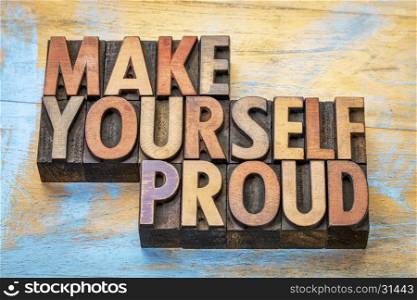 make yourself proud - motivational word abstract in vintage letterpress printing blocks