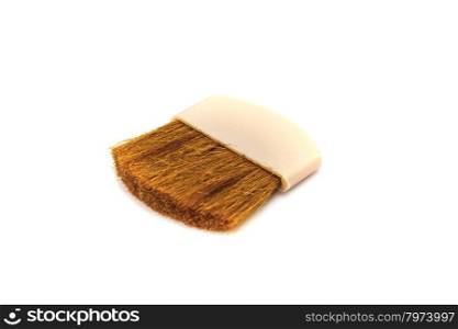 makeup brush and cosmetics on a white background