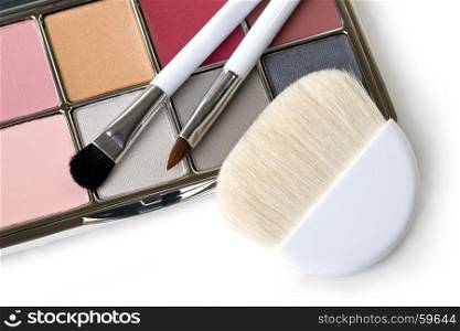 makeup brush and cosmetics, on a white background with clipping path