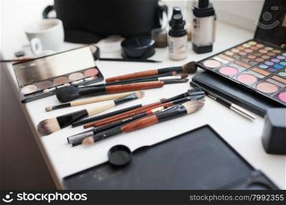 makeup brushes, closeup. Makeup artist working outdoor events