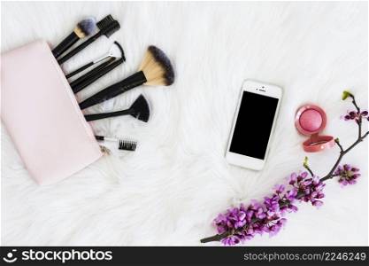 makeup brushes with smartphone compact face powder flower twig white fur