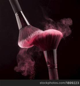 Makeup brushes with whirling pink powder Picture on pik. Resolution and high quality beautiful photo. Makeup brushes with whirling pink powder Picture on pik. High quality beautiful photo concept