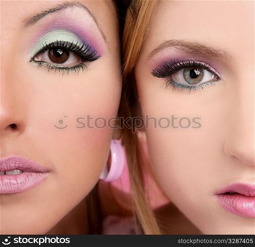 makeup closeup detail macro two faces multiracial pink eyeshadow and lipstick