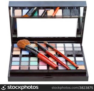 makeup kit and cosmetic brushes isolated on white background