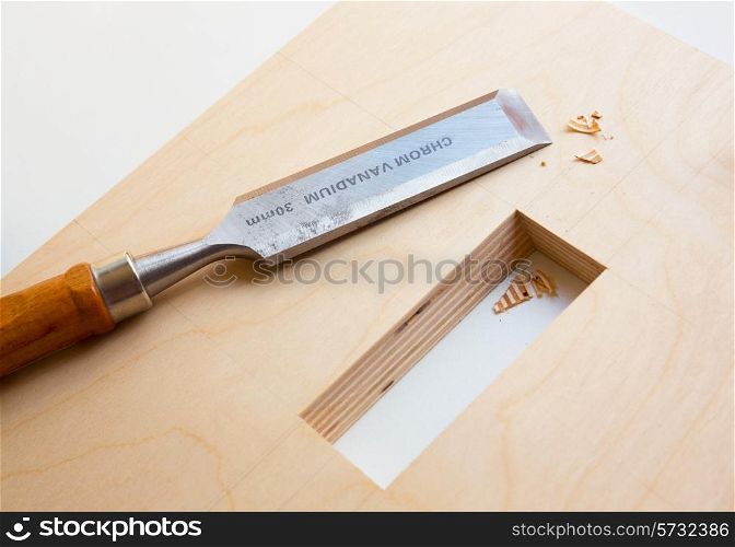 Making a component of wood furniture. Close-up photo