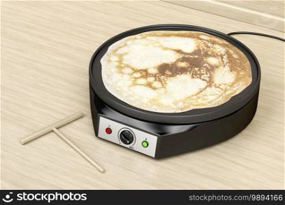 Making a pancake with electric pan in the kitchen
