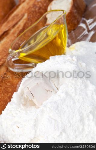 Making bread with yeast, oil and flour