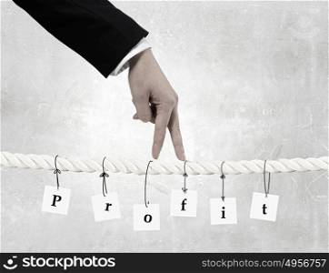 Making business advances. Close up of businessman hands walking with fingers on rope as partnership concept