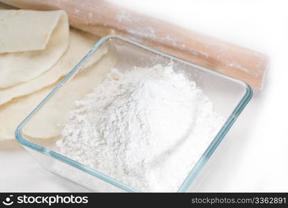 making fresh homemade pita bread ,with ingredients overa table