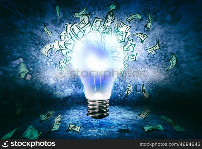 Making money. Conceptual image of light bulb and dollar banknotes