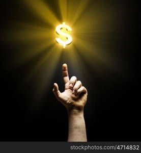 Making money. Human hand pointing at dollar symbol. Banking concept