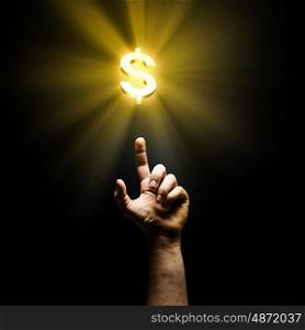 Making money. Human hand pointing at dollar symbol. Banking concept