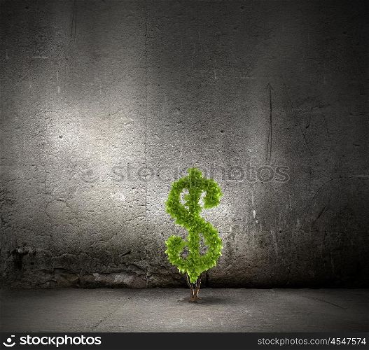 Making money. Image of money tree in shape of dollar symbol