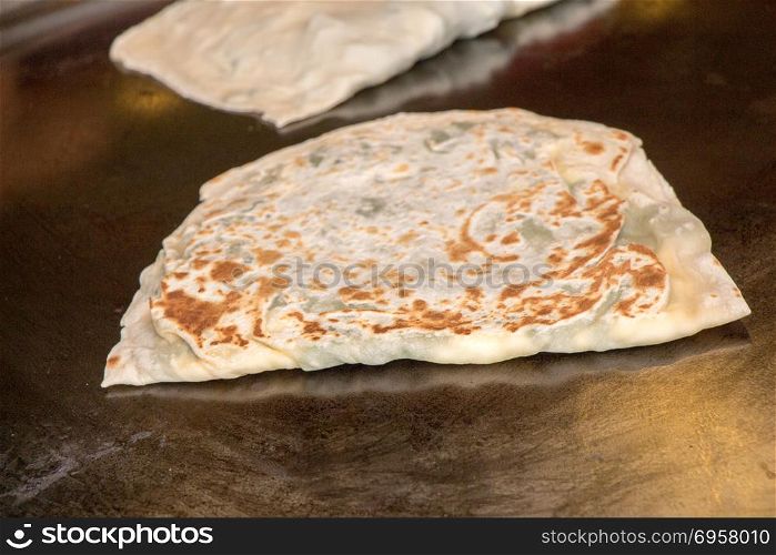 Making of traditional turkish gozleme pancake. Home making of traditional turkish gozleme pancake