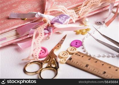 making scrapbooking album with rings and decorations on the table and tools