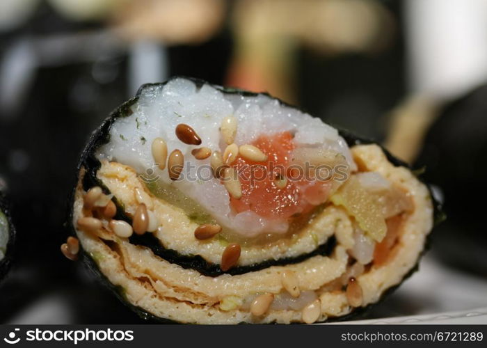 Makisuski, rice, egg and salmon rolled in seaweed