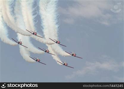 MALAGA, SPAIN-MAY 28: Aircrafts of the Patrulla Aguila taking part in an exhibition on the day of the spanish army forces on May 28, 2011, in Malaga, Spain. Patrulla Aguila