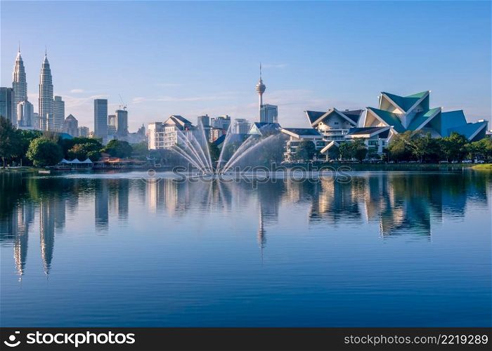 Malaysia. Kuala Lumpur. Lake Titivangsa, skyscrapers and Petronas Twin Towers. Morning. Morning in Kuala Lumpur